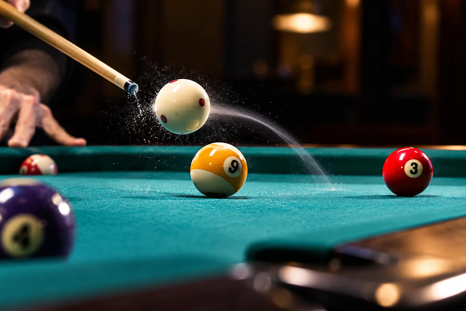 White cue ball jumping over a striped billiard ball during a dramatic pool jump shot on a teal felt table.